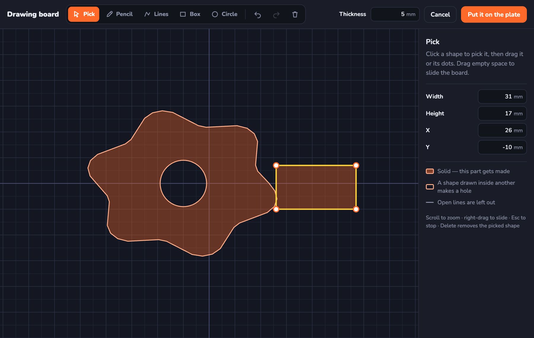 The Kids 3D Lab drawing board with a hand-drawn shape and a round hole