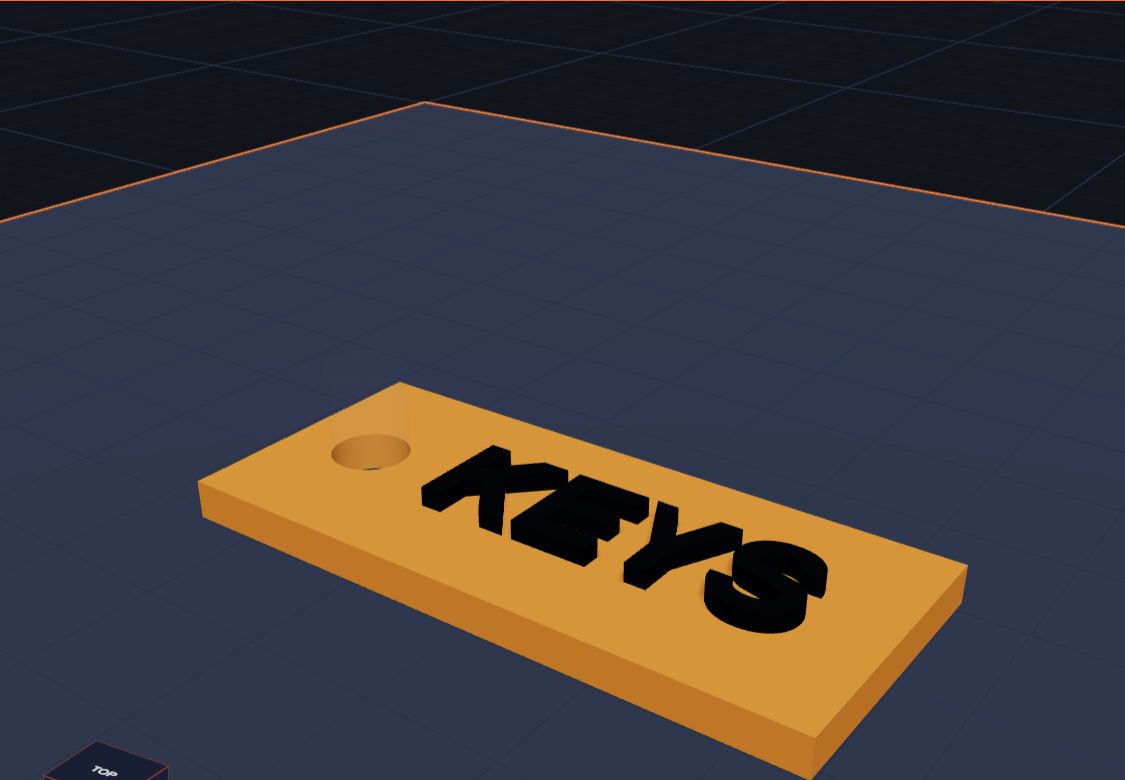 An orange key tag with the word KEYS in black and a hole, ready to be saved as a file