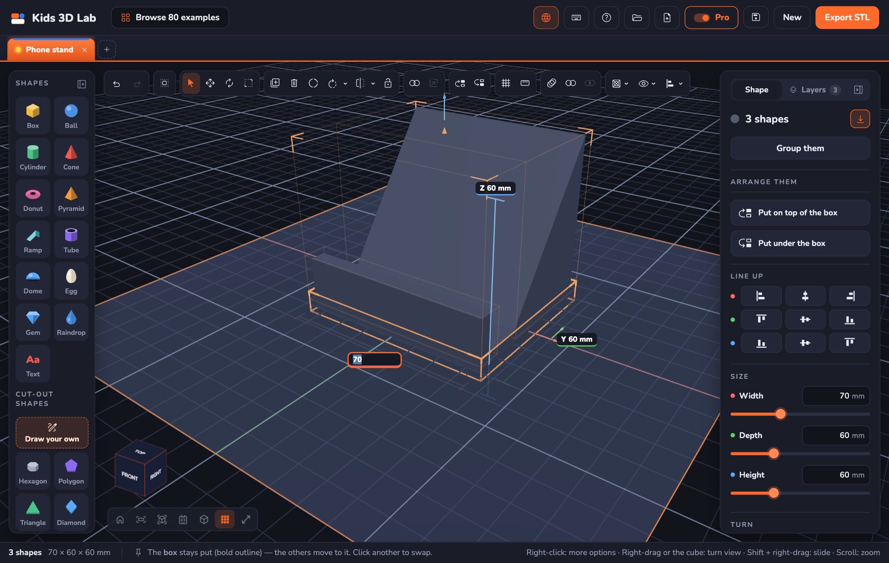 Pro mode in Kids 3D Lab: measurement lines beside a phone stand, with a new width being typed